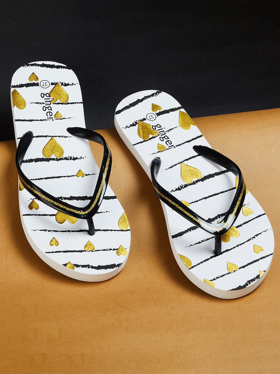 Ginger by Lifestyle Women Black & White Printed Rubber Thong Flip-Flops Price in India