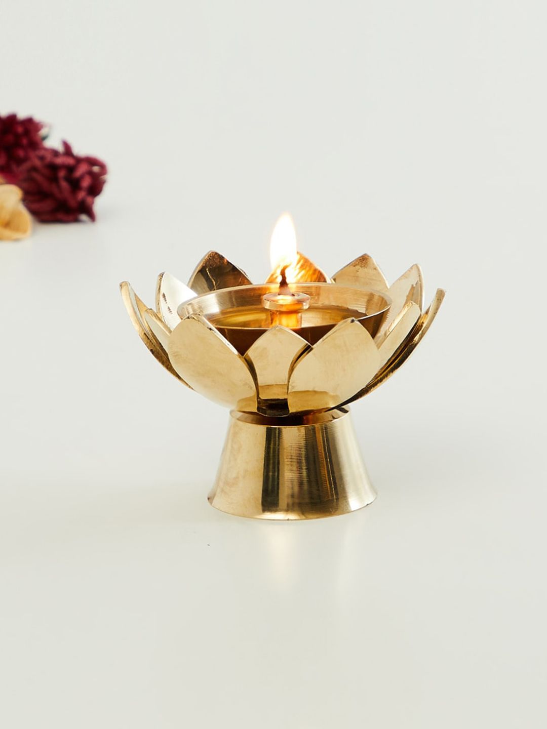 Home Centre Gold-Toned Petal-Shaped Metal Diya Price in India