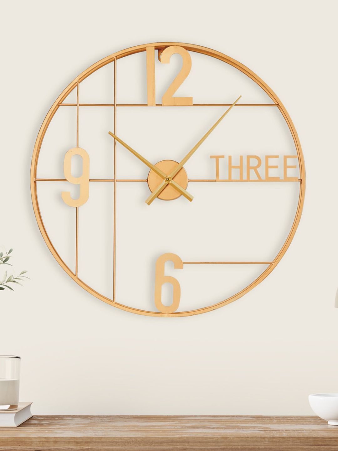 Home Centre Gold-Toned Textured Contemporary Wall Clock Price in India