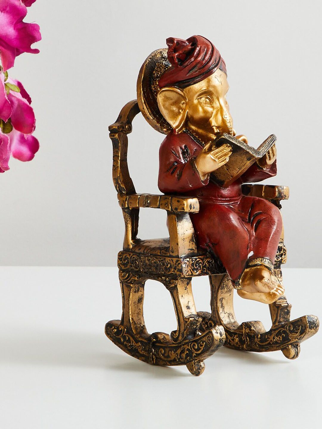 Home Centre Brown & Red Ganesha Sitting On Chair Showpieces Price in India