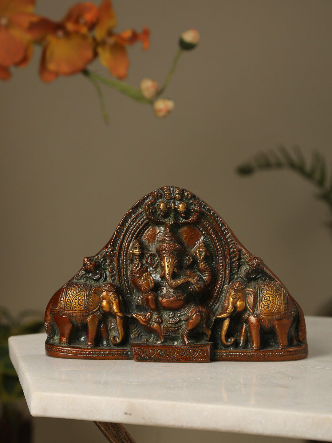 Amoliconcepts Gold-Toned Ganesha Statue With Elephants Idol Showpieces Price in India