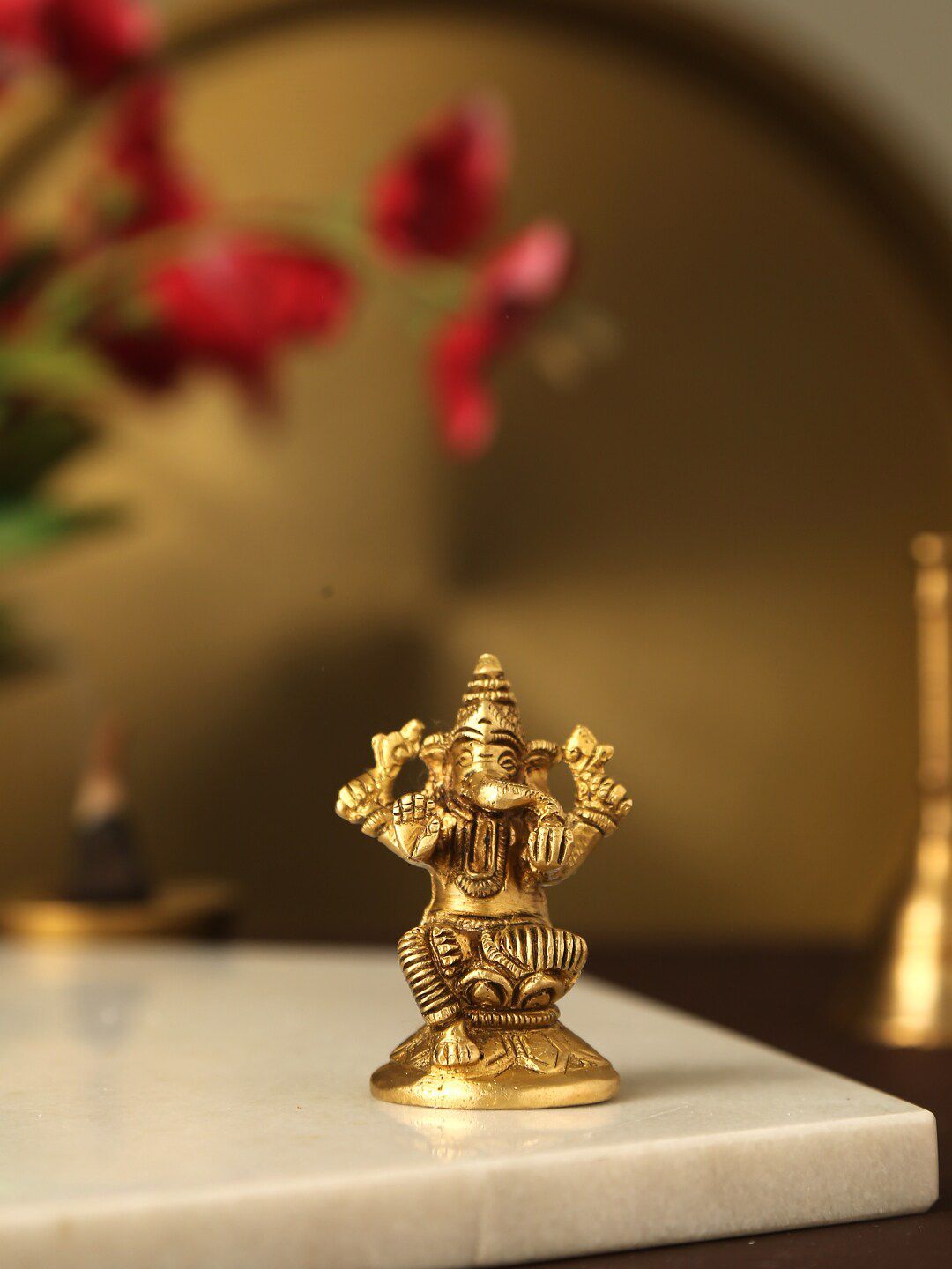 Amoliconcepts Gold-Toned Lord Ganesha Idol Showpiece Price in India