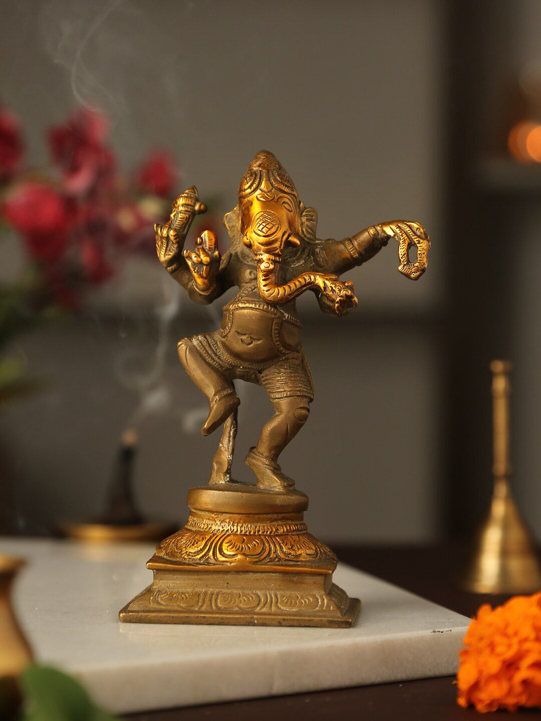 Amoliconcepts Gold toned Brass Dancing Ganesh Showpieces Price in India