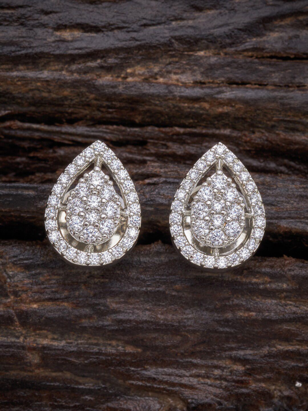 Kushal's Fashion Jewellery White Teardrop Shaped Studs Earrings Price in India