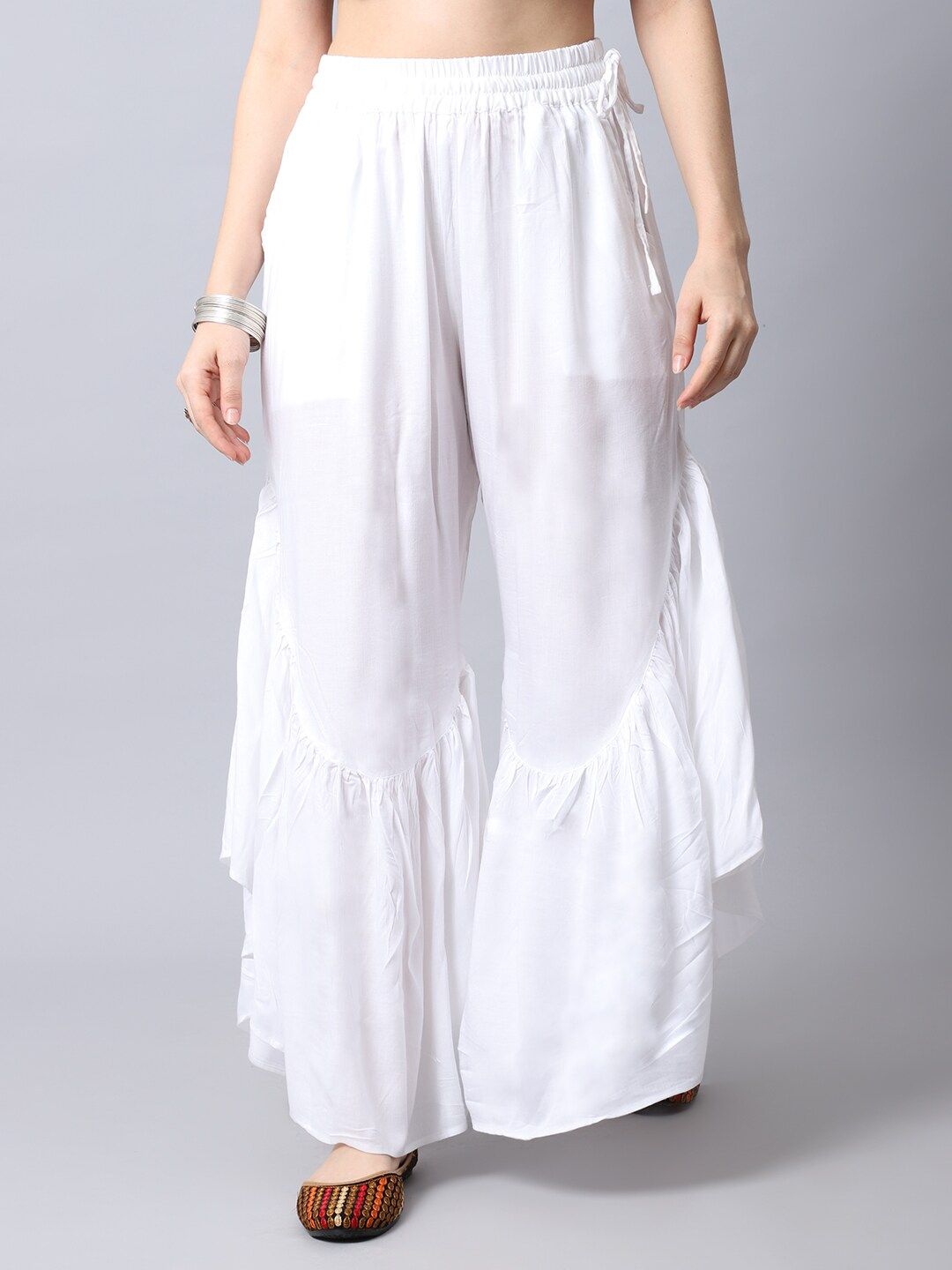 TAG 7 Women White Flared Ethnic Palazzos Price in India
