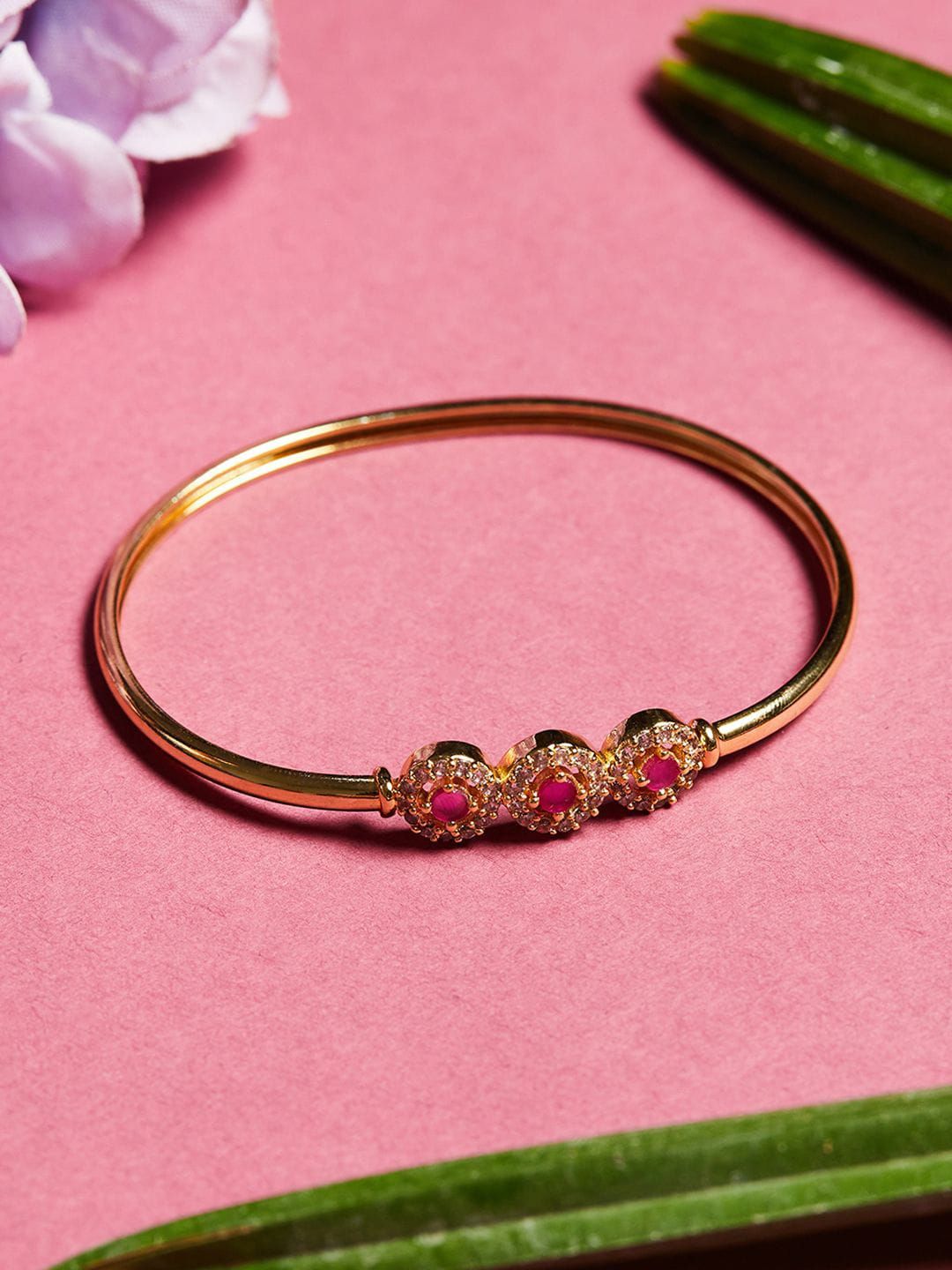 Voylla Women Gold-Toned & Pink Brass Cubic Zirconia Gold-Plated Kada Bracelet Price in India