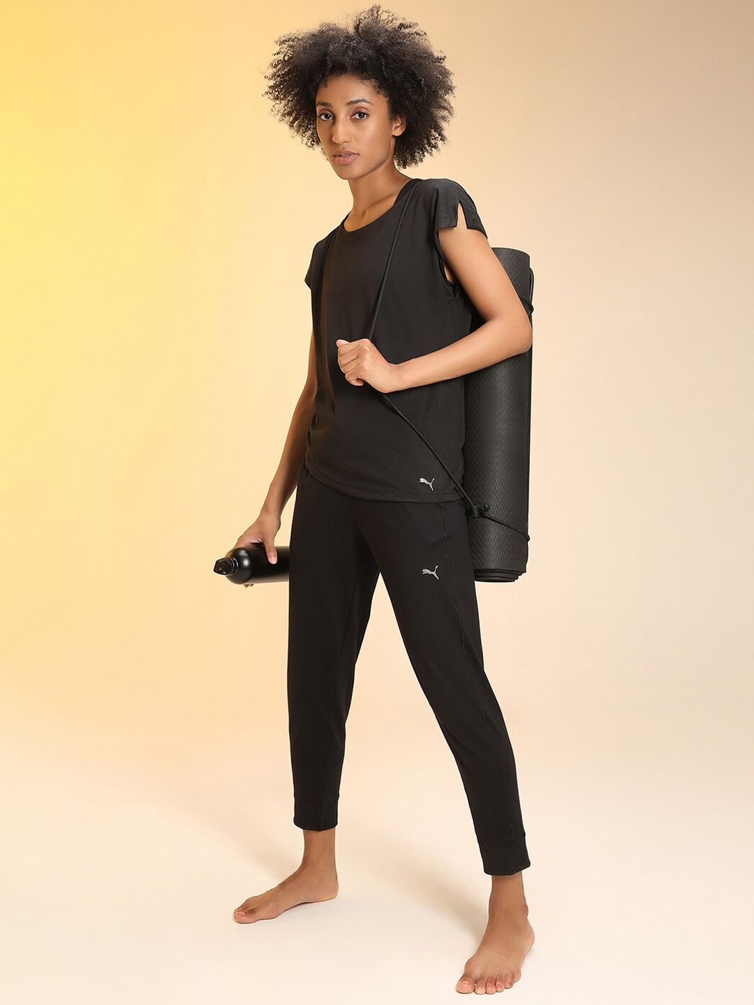 Puma Women Black Studio Found Knitted 3/4 Training Pants Price in India