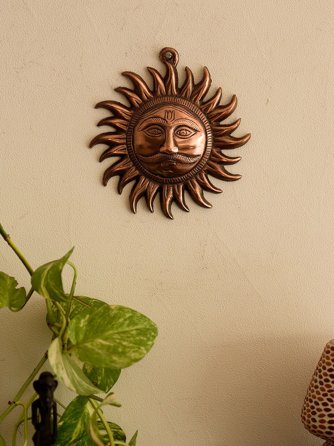 eCraftIndia Brown Solid Metal Sun Wall Hanging Price in India