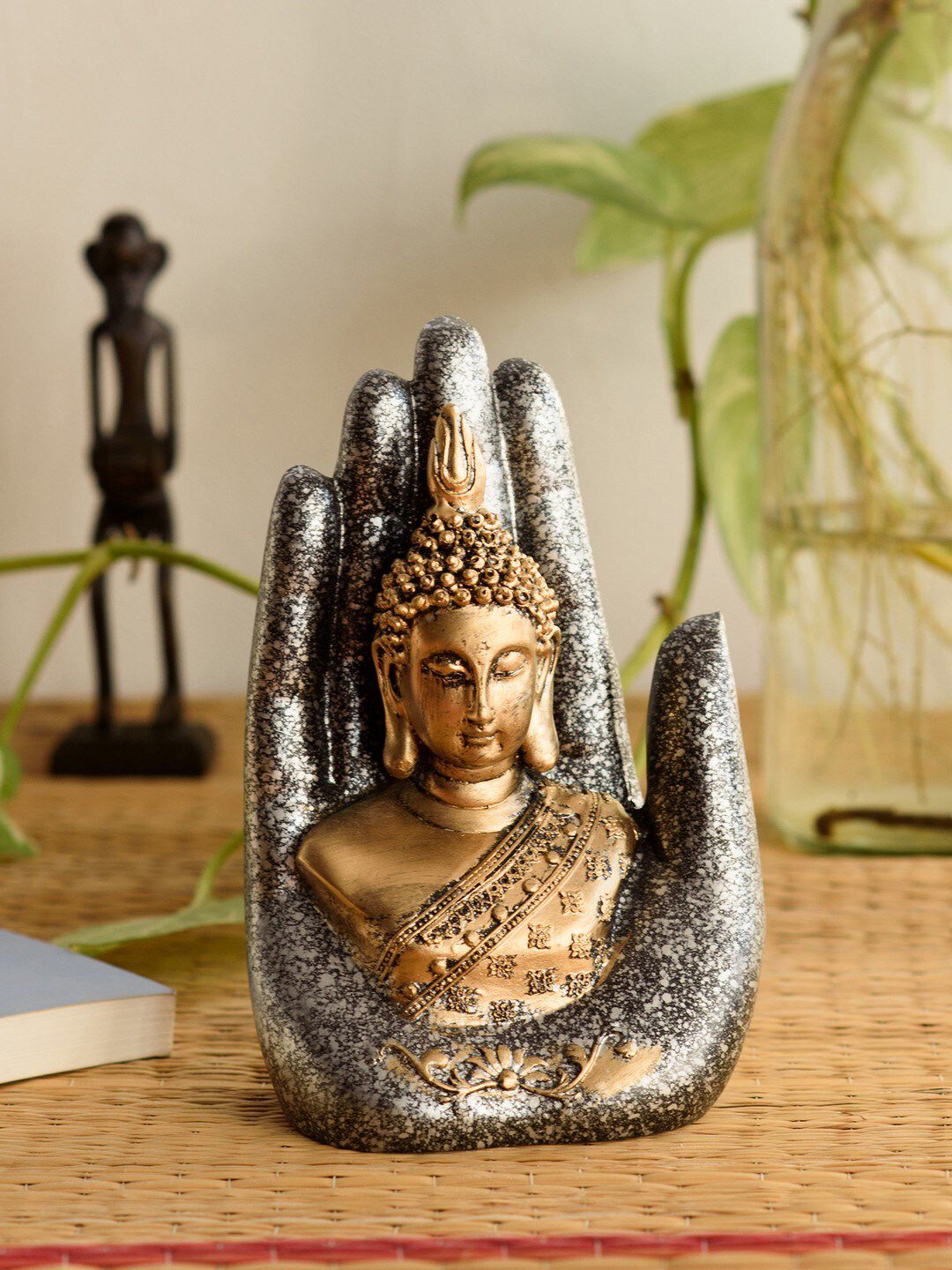 eCraftIndia Silver-Toned & Bronze Handcrafted Buddha Palm Idol Showpiece Price in India