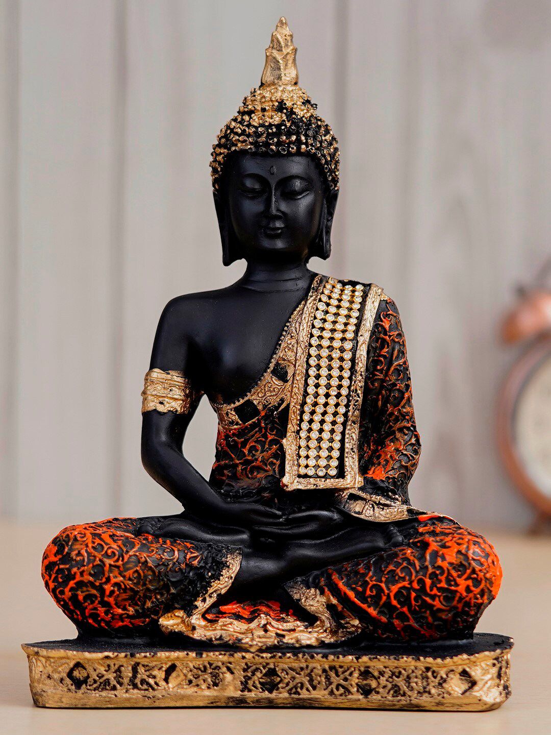 eCraftIndia Orange Meditating Buddha Decorative Showpieces Price in India