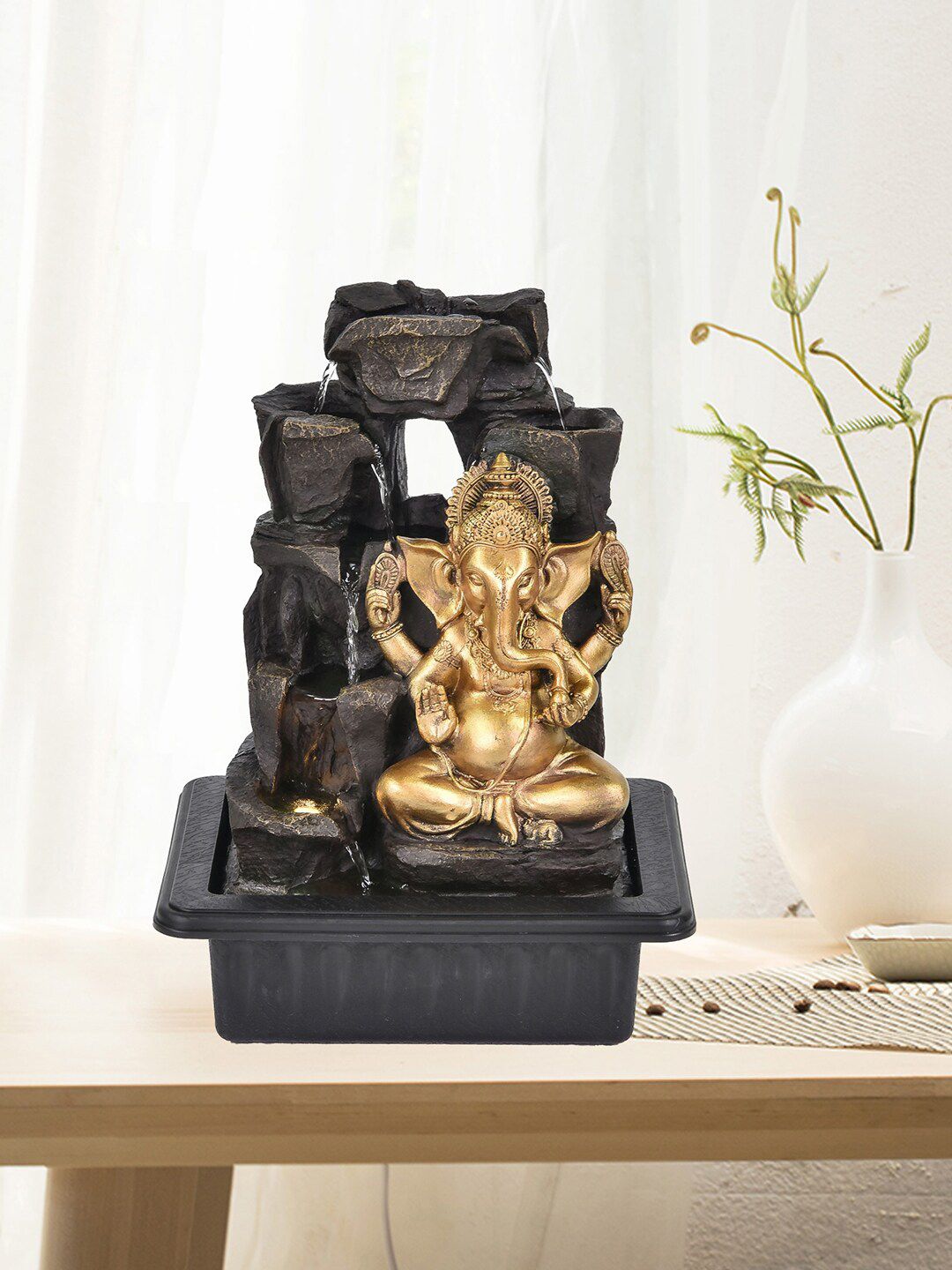 HomeTown Gold & Black Ganesha Idol Polyresin  Fountains Price in India