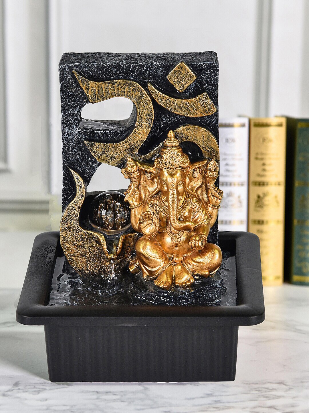 HomeTown Black & Gold-Toned Textured Polyresin Ganesha Fountains Price in India