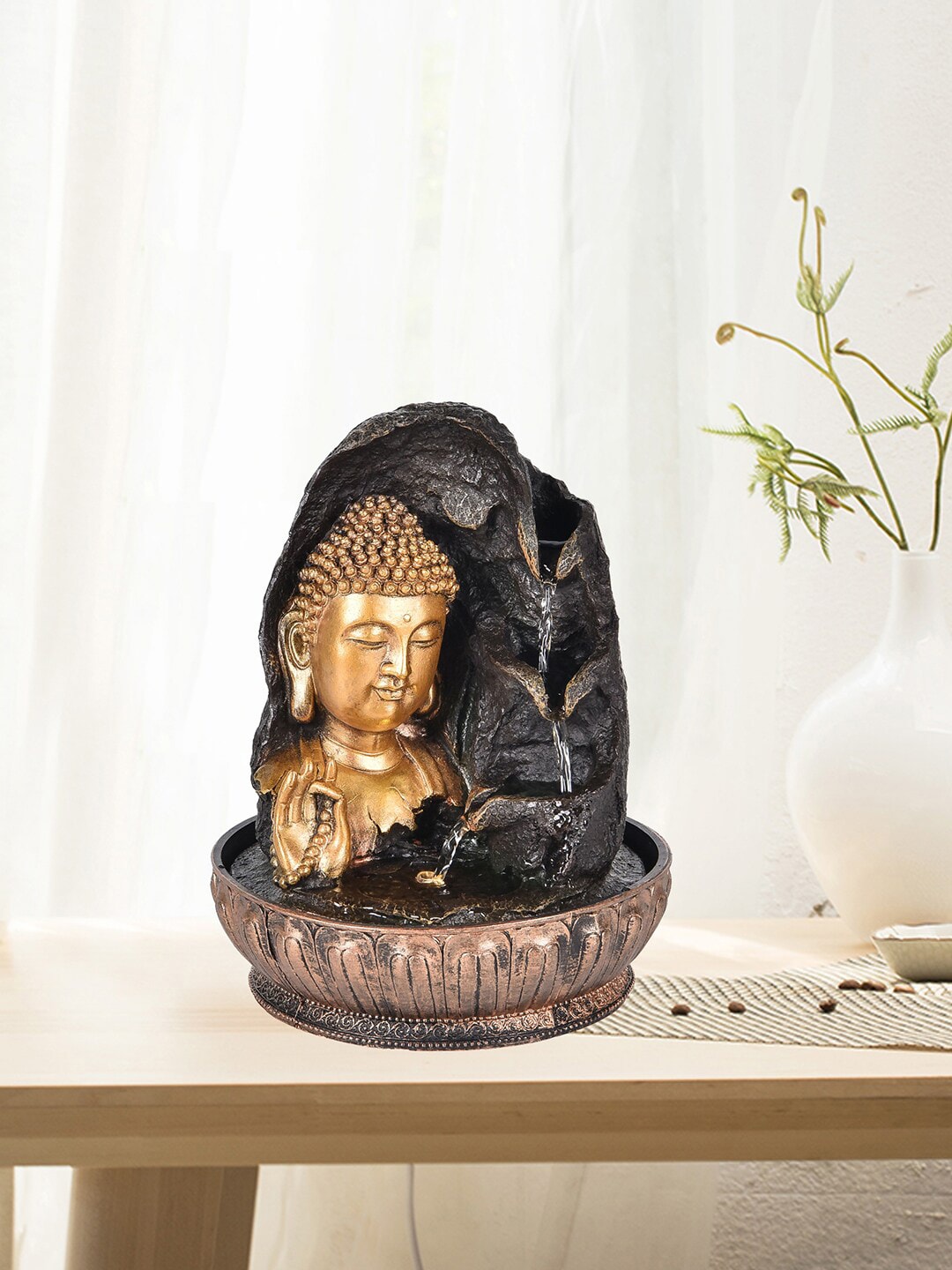 HomeTown Black & Gold Blessing Buddha Face Fountain Price in India