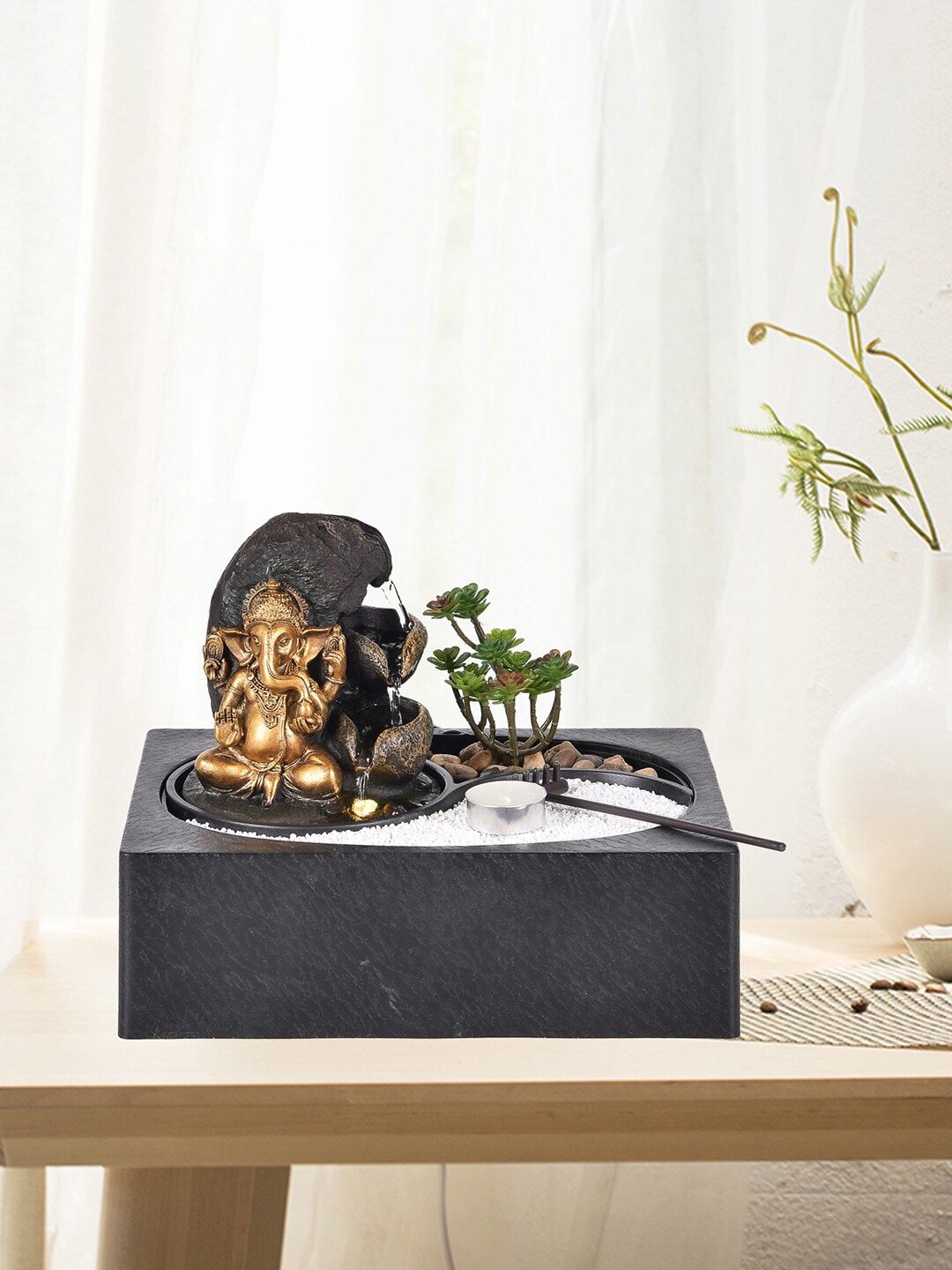 HomeTown Gold & Black Ganesha Idol Polyresin  Fountains Price in India