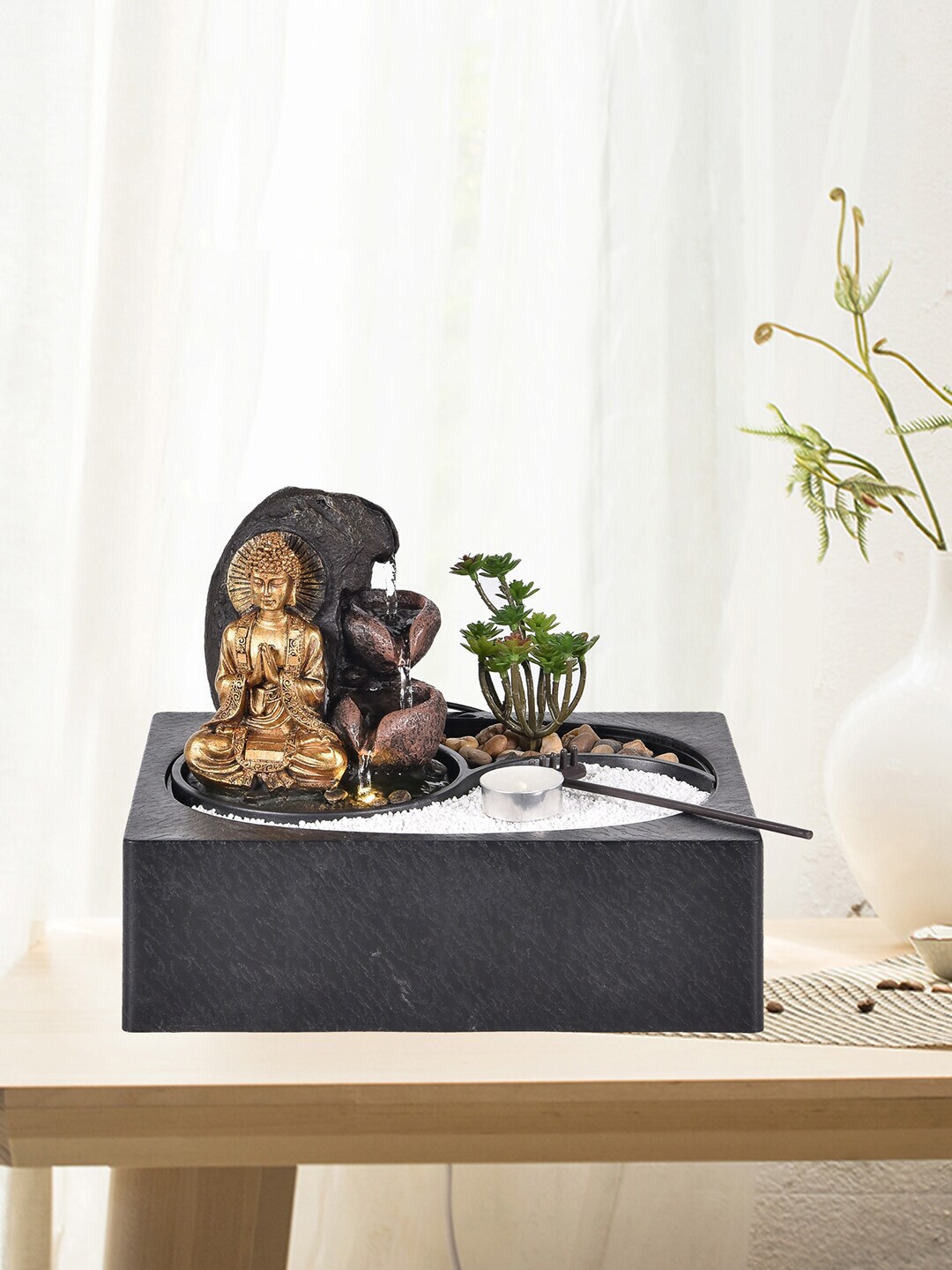 HomeTown Gold-Colored & Black Sand Buddha Indoor Fountains Price in India