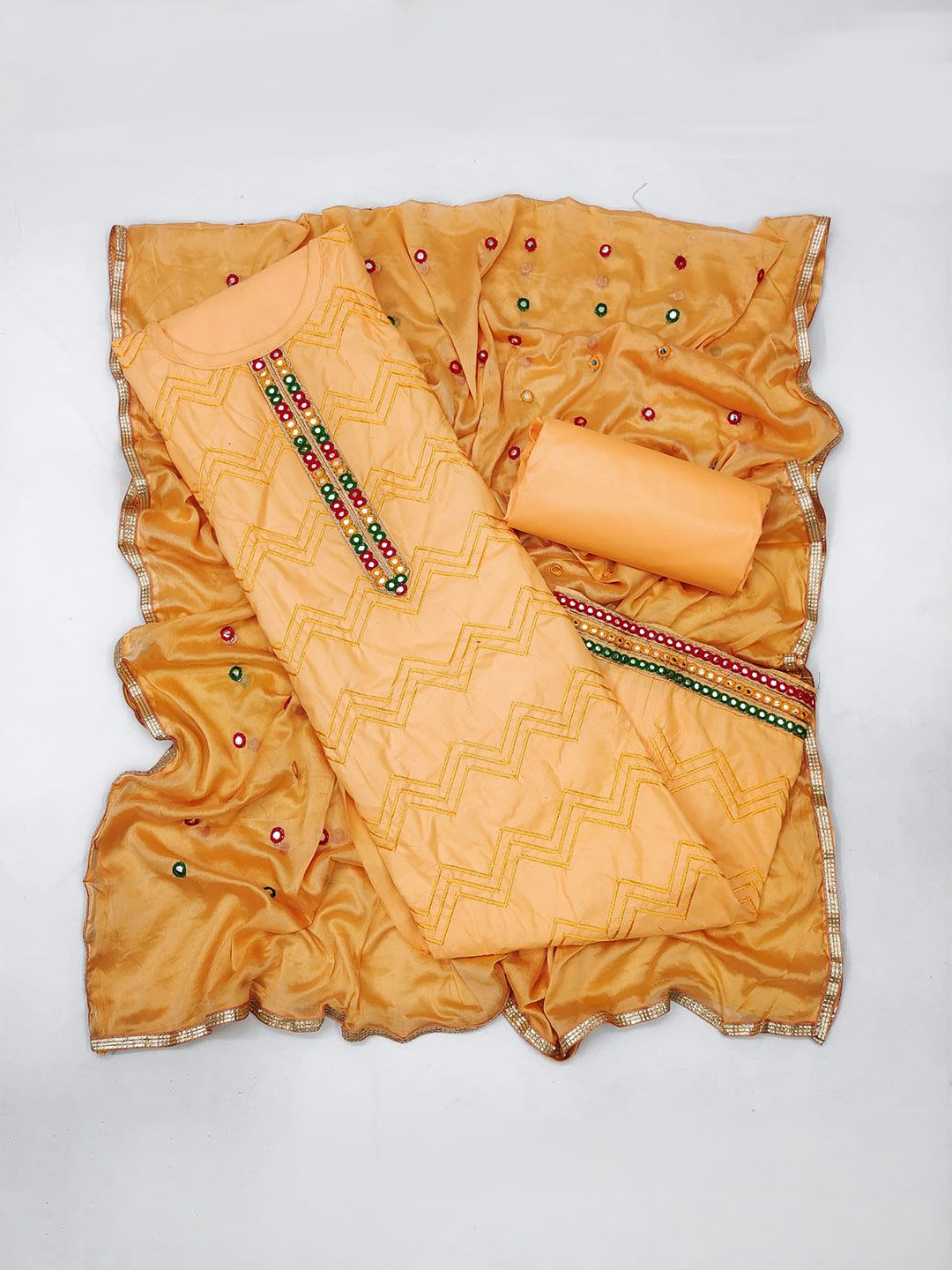 Suktam Trendz Yellow & Red Unstitched Dress Material Price in India