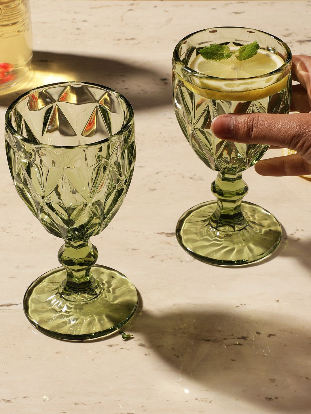 The Decor Mart Set Of 2 Green Textured Tinted Goblet Glass Price in India