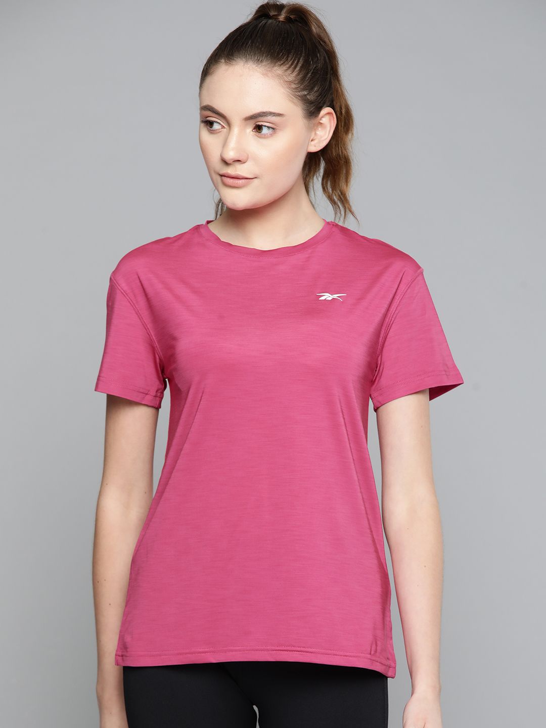 Reebok Women Pink TS ACTIVCHILL Athletic Solid Training T-Shirt Price in India