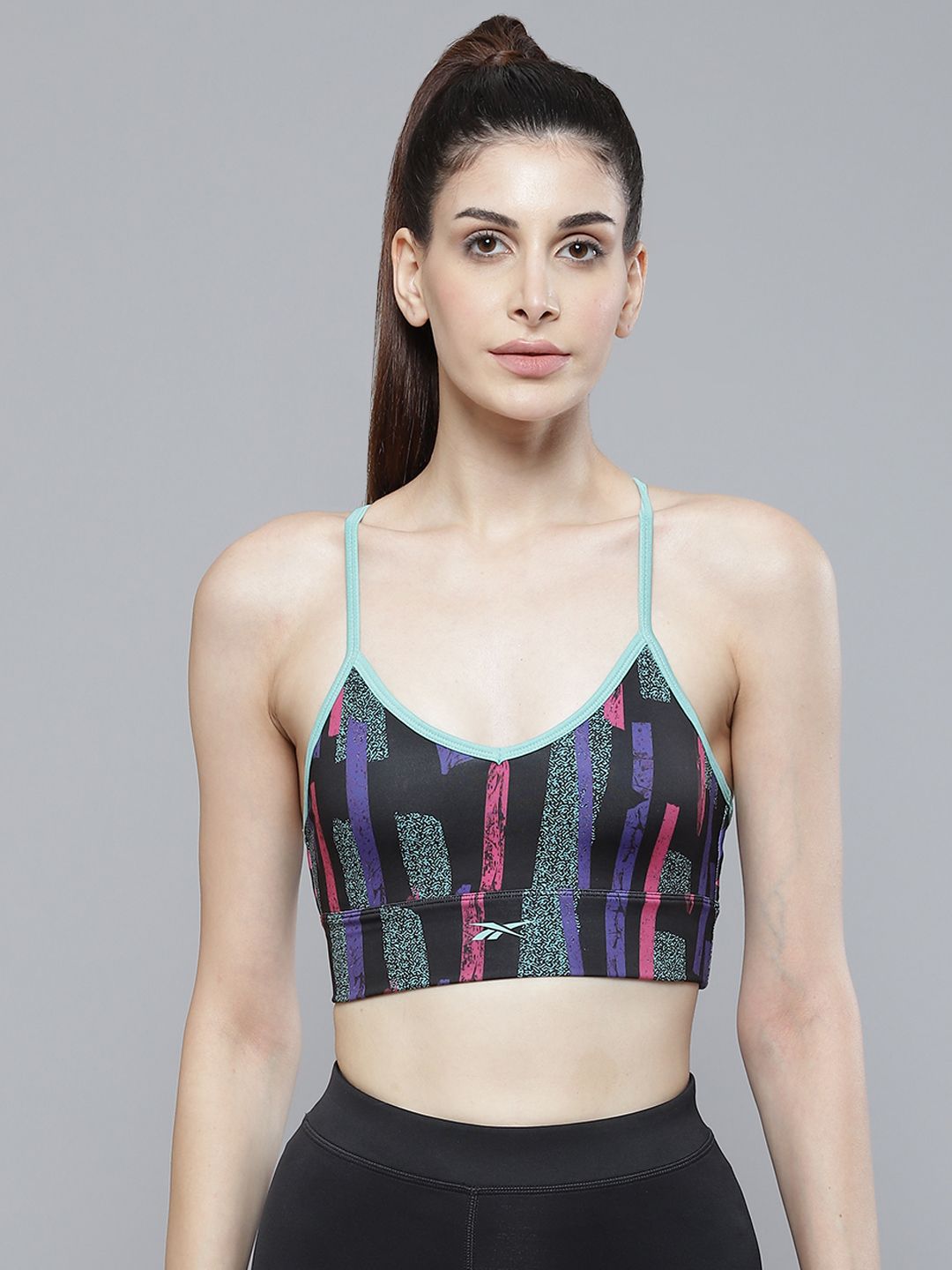 Reebok Black & Sea Green MYT Printed Removable Padding Sports Bra Price in India