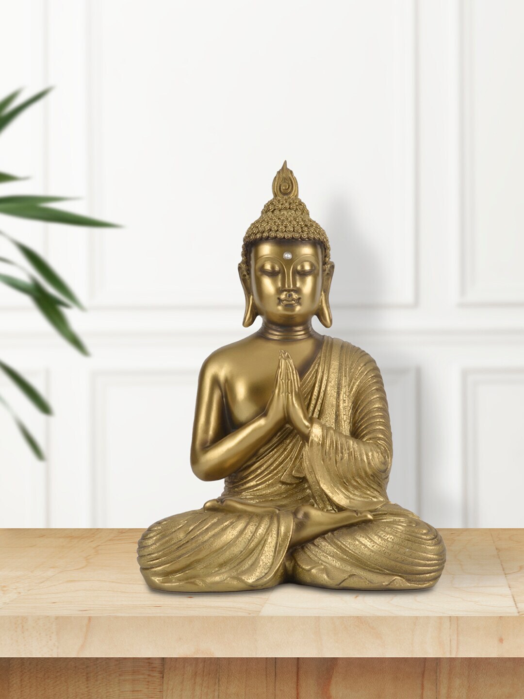 HomeTown Gold Praying Buddha Figurine Showpieces Price in India