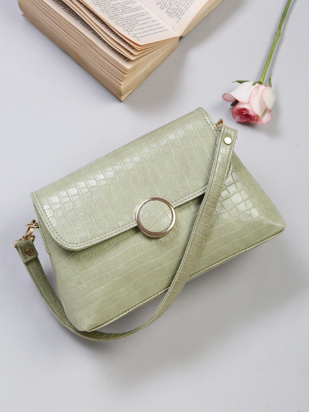 Apsis Green Textured Structured Sling Bag with Tasselled Price in India