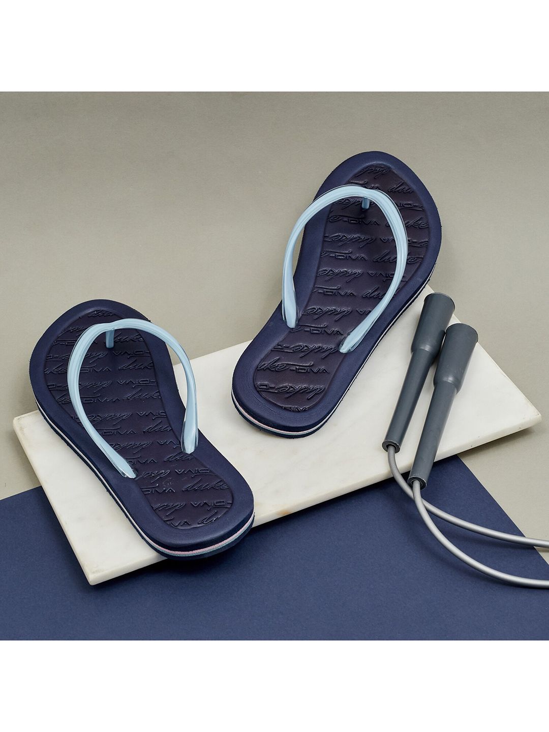 Duke Women Navy Blue Thong Flip-Flops Price in India