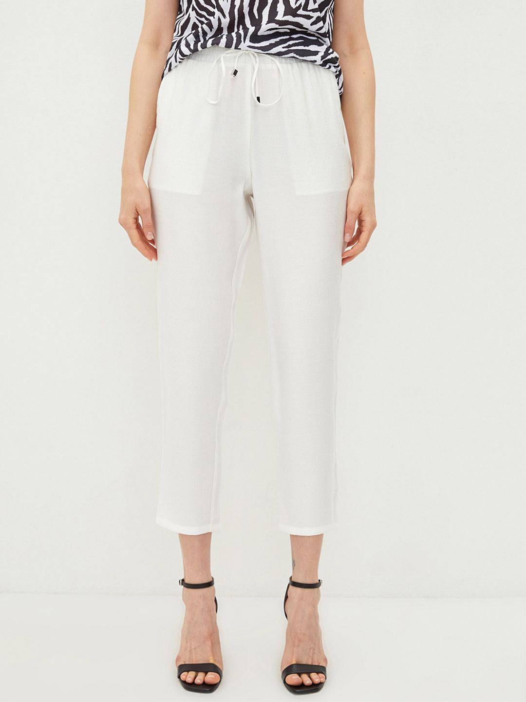 LC Waikiki Women White Straight Fit Cropped Trousers Price in India