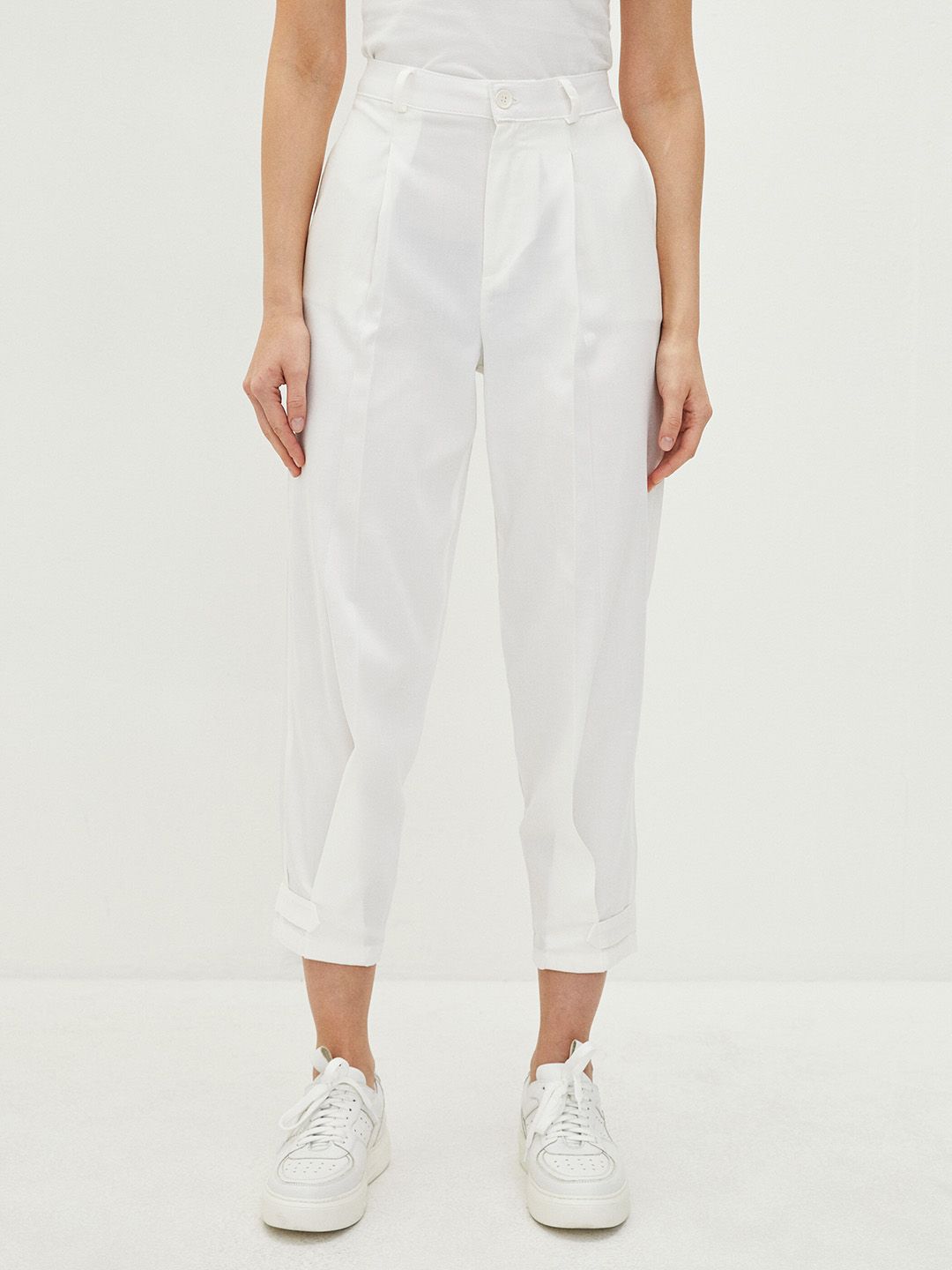 LC Waikiki Women White Solid Straight Fit Pleated Trousers Price in India