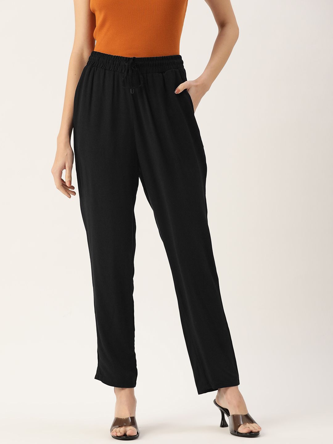 LC Waikiki Women Black Solid Straight Fit Pleated Trousers Price in India