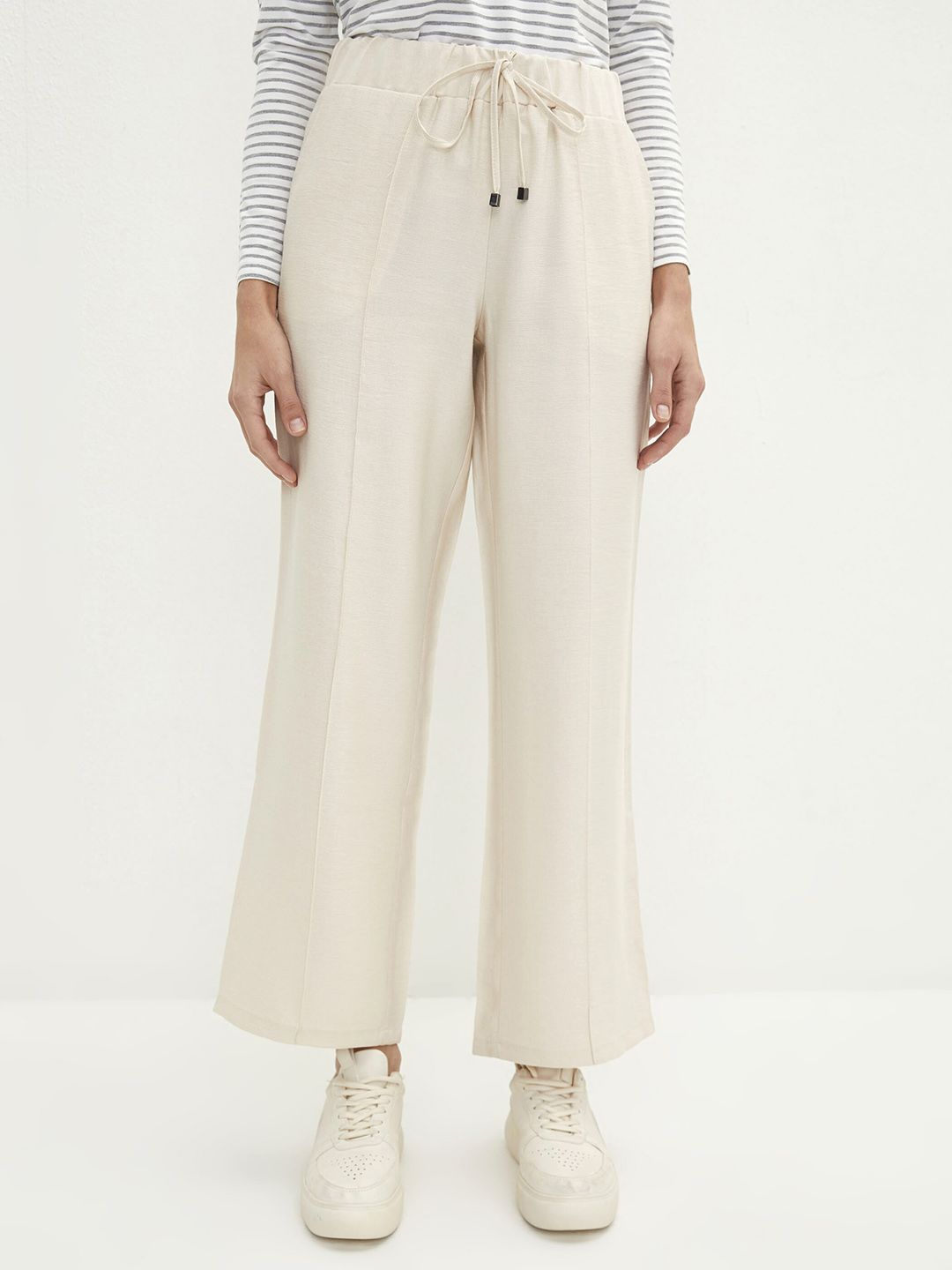 LC Waikiki Women Beige Straight Fit Pleated Trousers Price in India