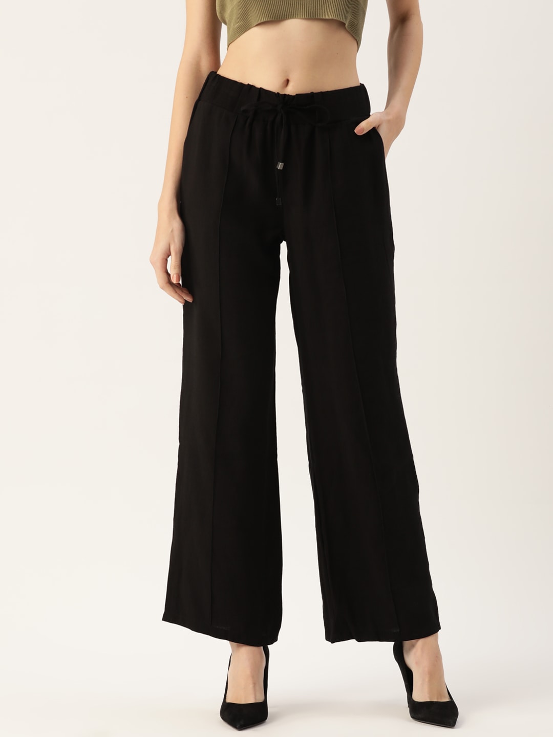 LC Waikiki Women Black Solid Flared Trousers Price in India