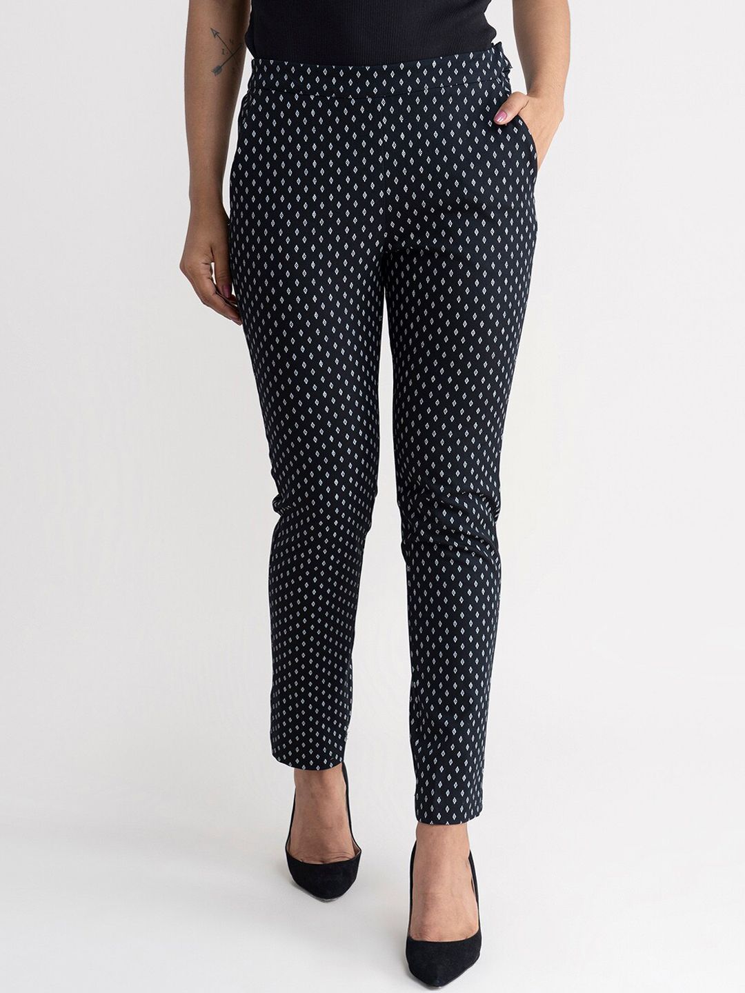 FableStreet Women Black Printed Straight Fit Trousers Price in India