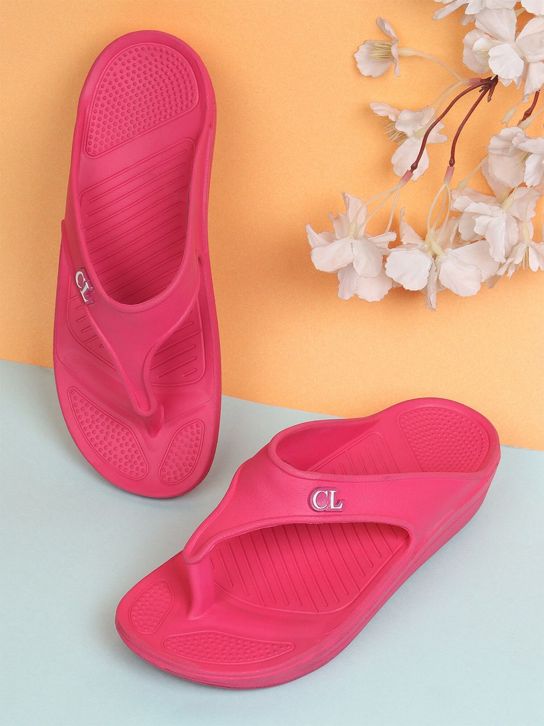 Carlton London Women Fuchsia Croslite Thong Flip-Flops Price in India