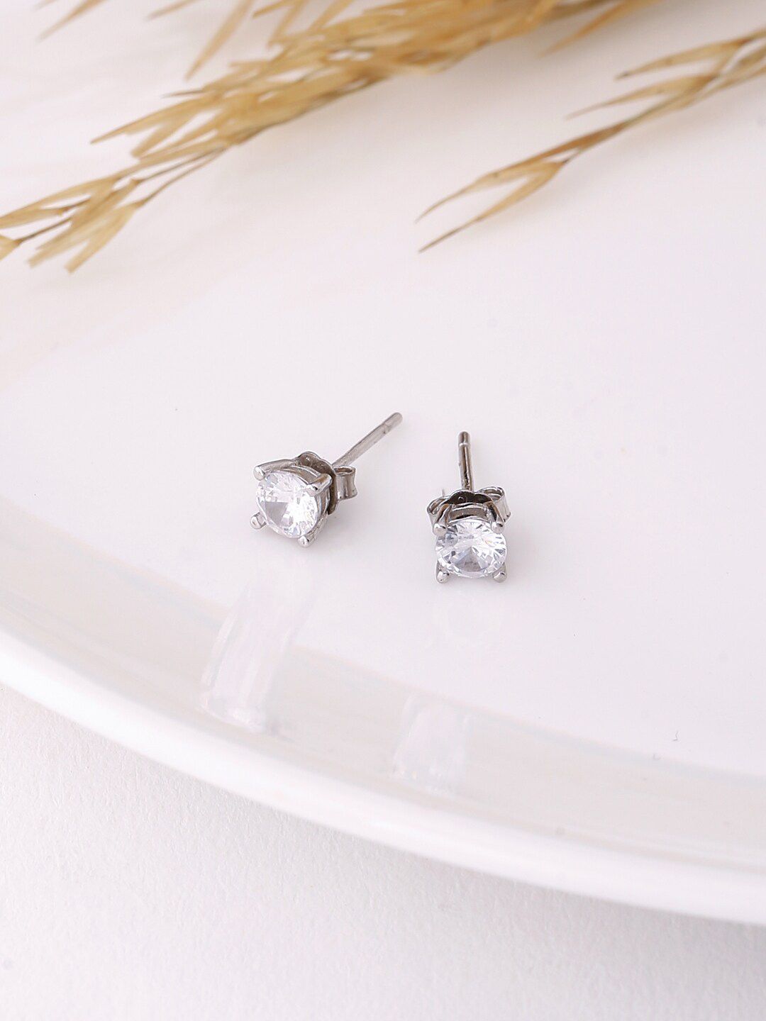 ADORN by Nikita Ladiwala Silver-Toned Circular Studs Earrings Price in India