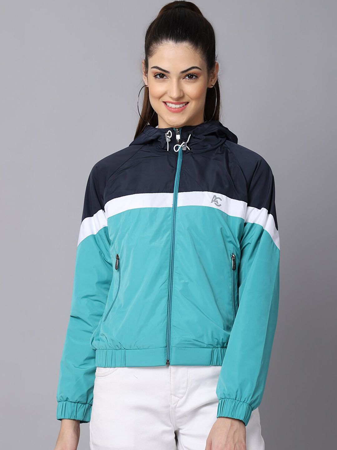 ANTI CULTURE Women Sea Green Colourblocked Windcheater Crop Outdoor Sporty Jacket Price in India