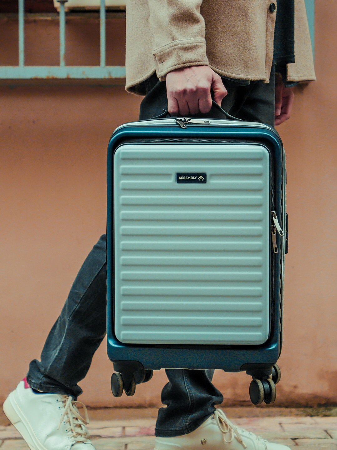 Assembly Teal Textured Hard-sided Trolley Bag Price in India