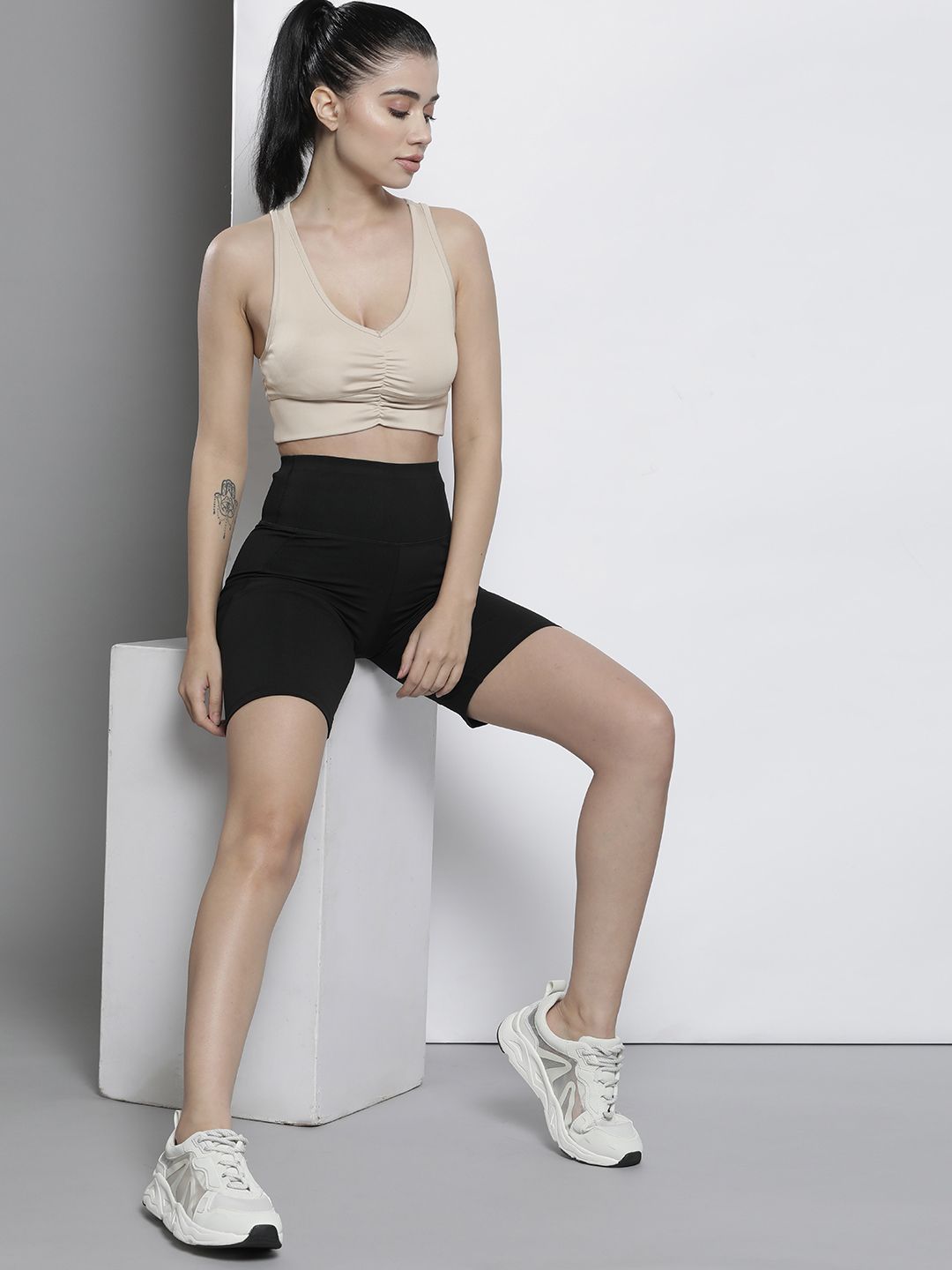 DeFacto Beige Solid T-Shirt Sports Bra Price in India