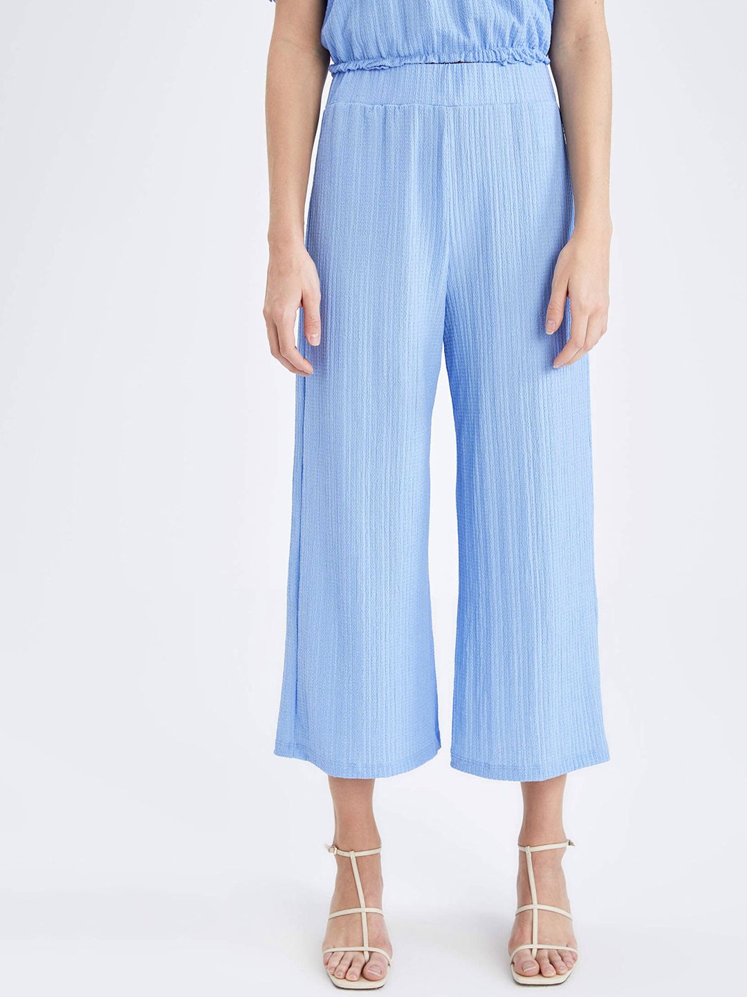 DeFacto Women Blue Textured Trousers Price in India