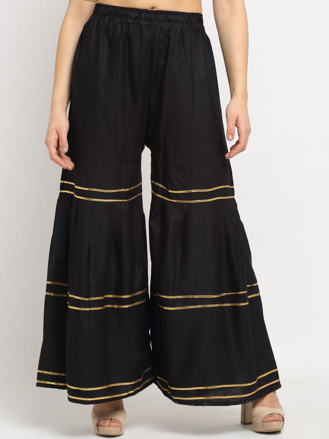 NEUDIS Women Black & Gold-Toned Flared Palazzos Price in India