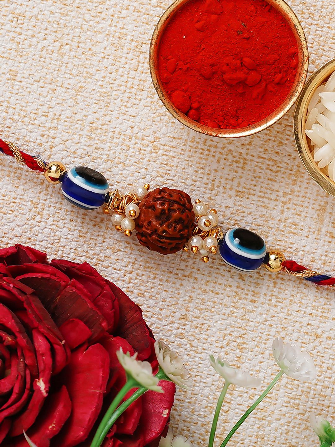 eCraftIndia Multicoloured Evil eye Rudraksh Rakhi and Roli Chawal