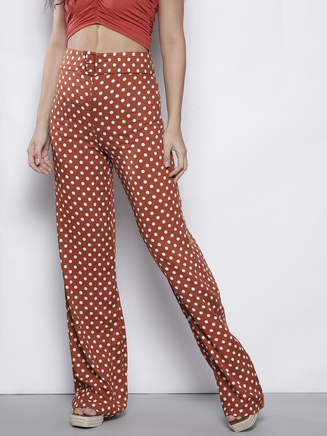 Trendyol Women Rust Brown Polka Dots Printed Flared High-Rise Trousers Price in India
