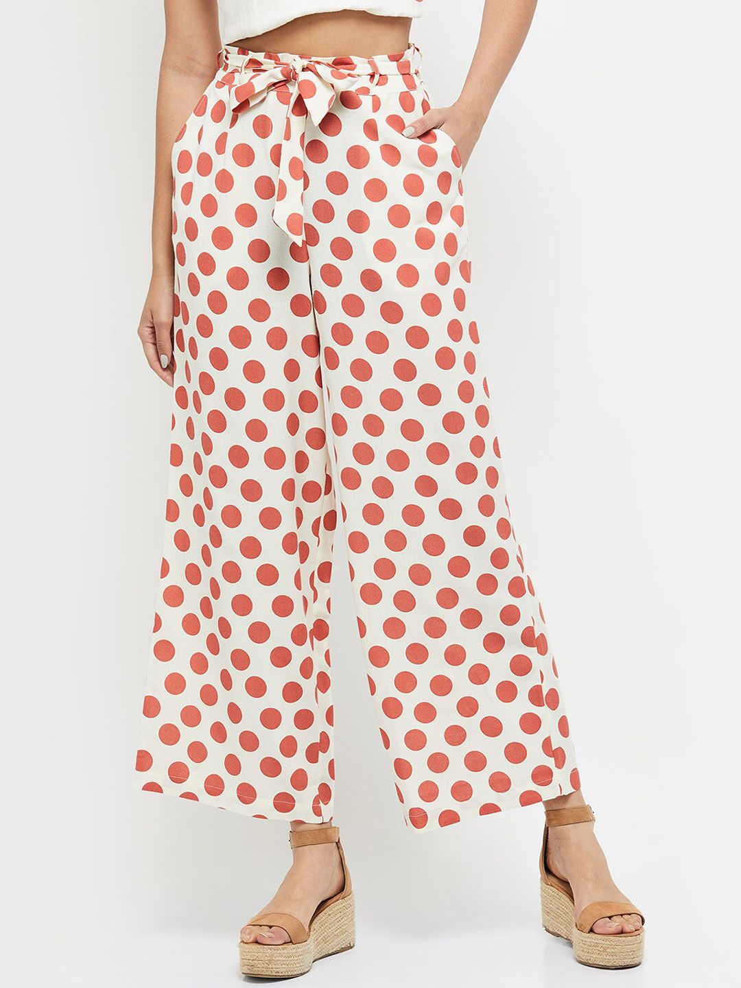 max Women Rust Printed Trousers Price in India