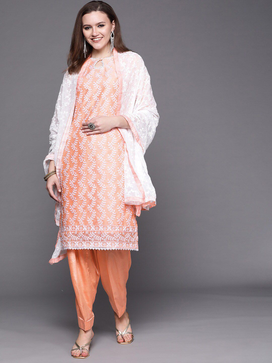 Chhabra 555 Women Peach Dress Material Price in India