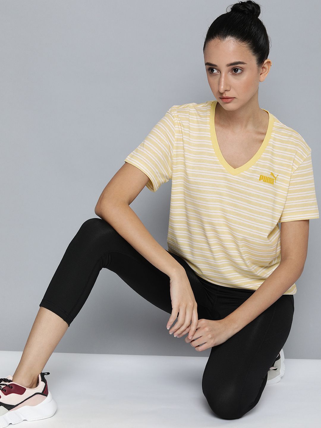 Puma Women Yellow & White Striped V-Neck Essential AOP T-shirt Price in India