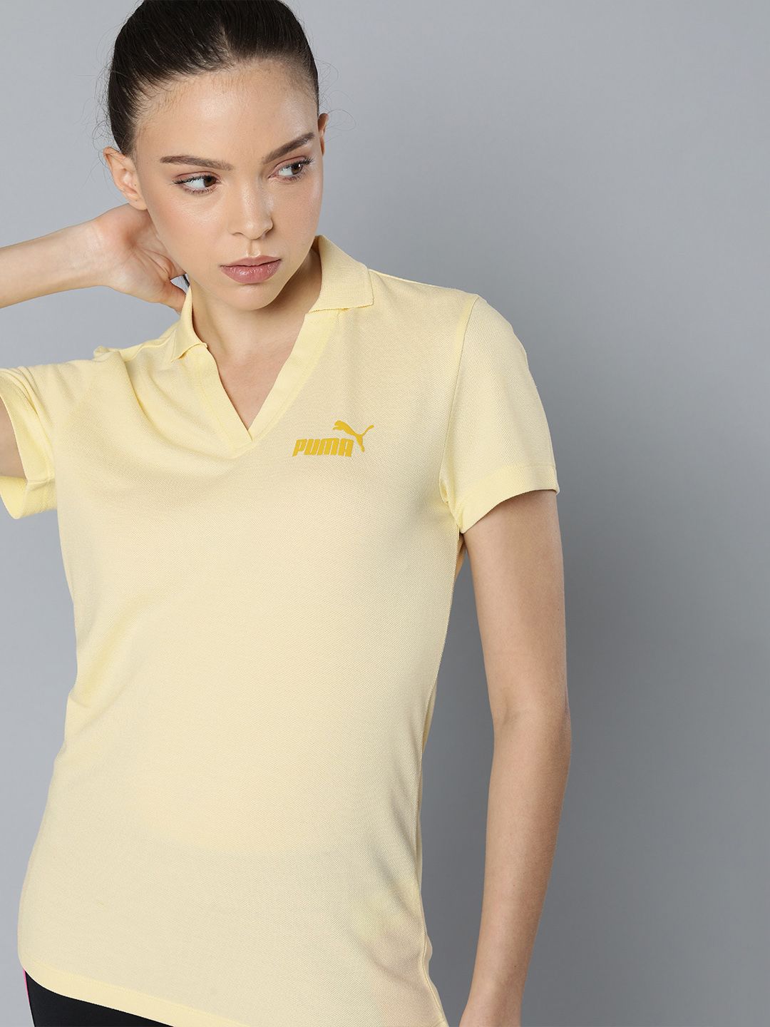 Puma Women Yellow Self Design Essential V-Neck Applique T-shirt Price in India