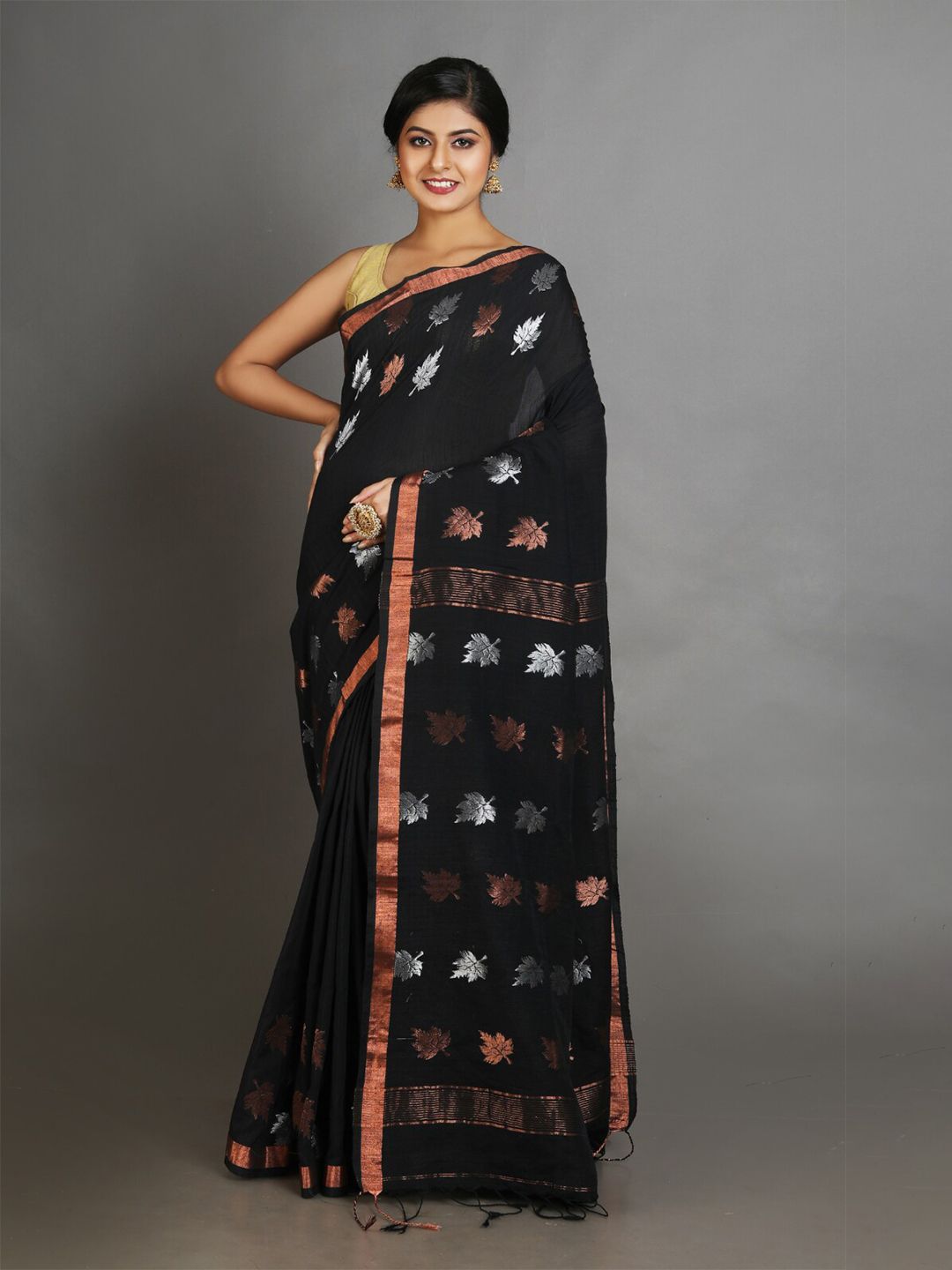 Charukriti Black & Copper-Toned Woven Design Pure Linen Saree Price in India