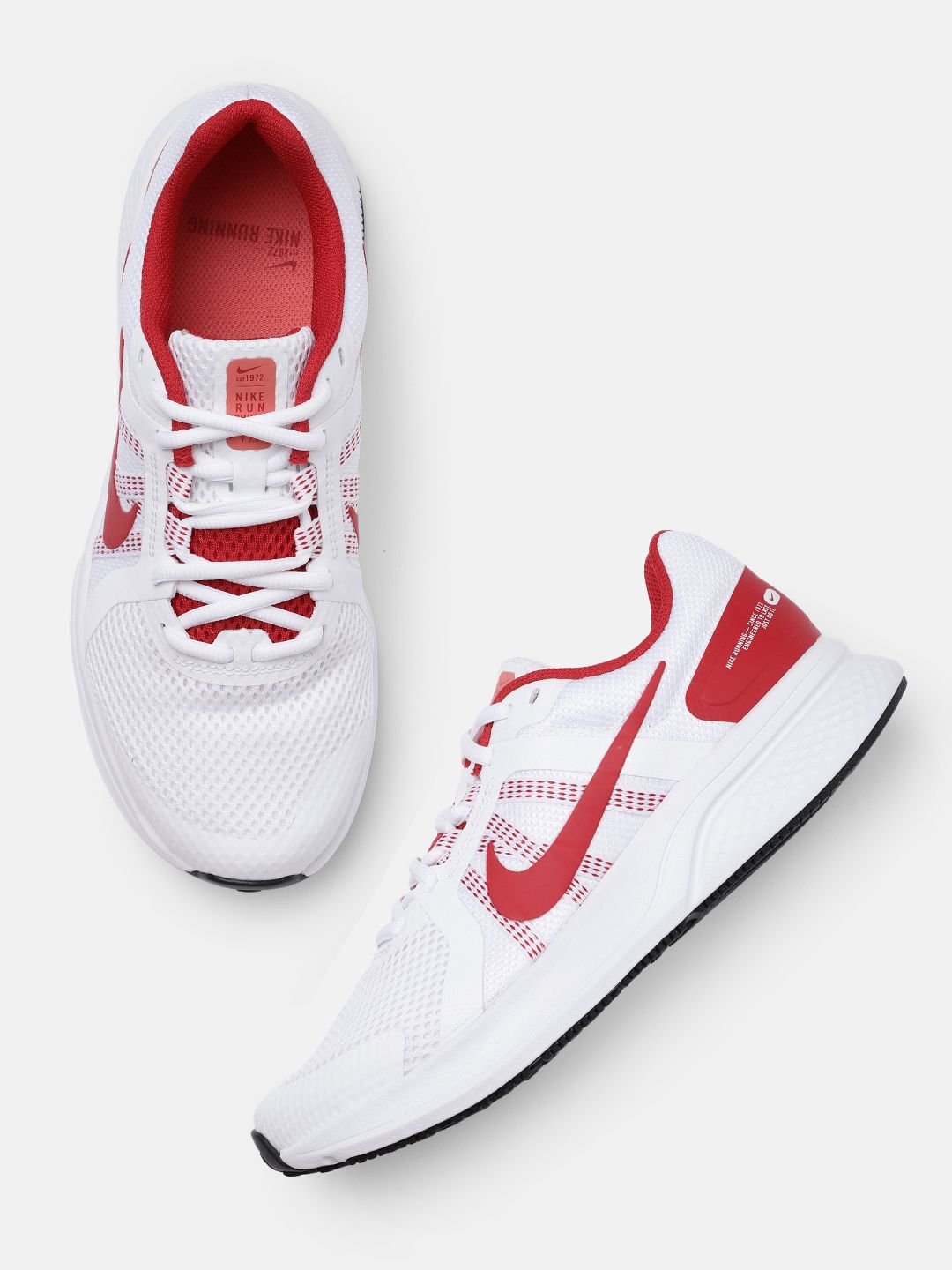 Nike Women White Solid Run Swift 2 Running Shoes Price in India