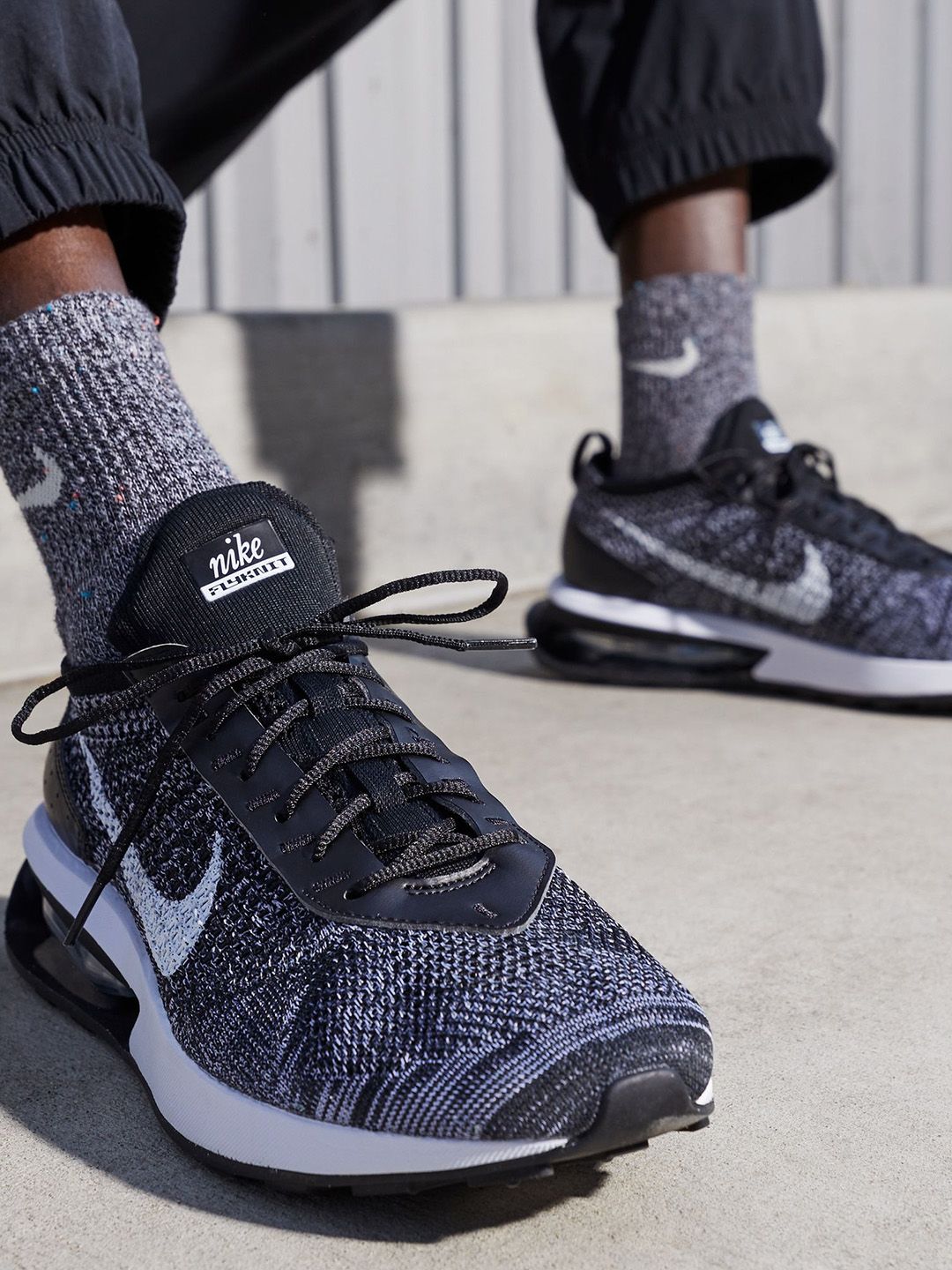 nike flyknit racer gray