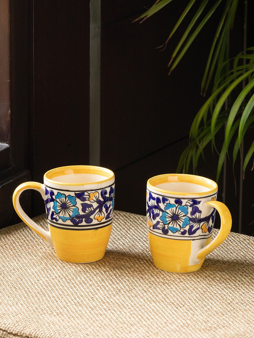 ExclusiveLane Yellow & Blue Floral Printed Ceramic Glossy Mugs Set of Cups and Mugs Price in India