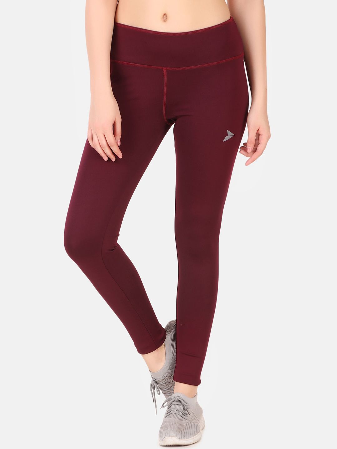 FITINC Women Maroon Solid Dry-Fit Tights Price in India